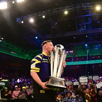 03-01-2026-2025-26-World-Darts-Championship-Luke-Littler-kisses-the-trophy-during-the-2025-26-Paddy-Power-World-Darts-Championships-final-at-Alexandra-Palace-London-United-Kingdom-on-3-January-2026