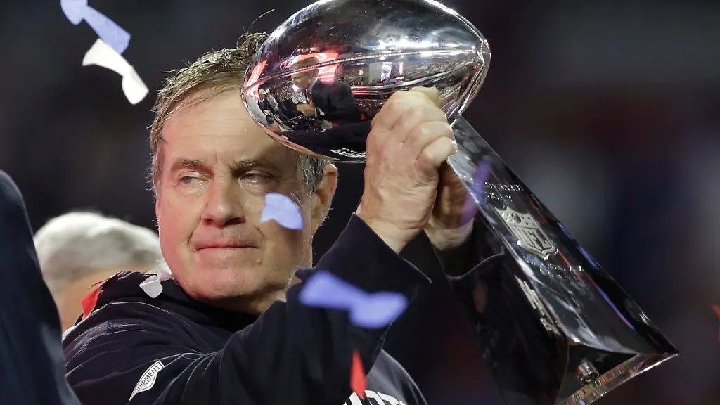 FILE-New-England-Patriots-head-coach-Bill-Belichick-holds-up-the-Vince-Lombardi-Trophy-as-he-celebrates-after-the-Patriots-defeated-the-Seattle-Seahawks-28-24-in-NFL-Super-Bowl-XLIX-football-game-Sunday-Feb-1-2015-in-Glendale-Ariz
