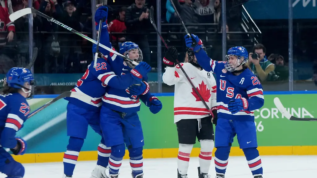 THE-CANADIAN-PRESS-2026-02-19-United-States-Tessa-Janecke-22-Hilary-Knight-21-and-Alex-Carpenter-25-celebrate-Knight-s-goal-against-Canada-during-the-third-period-of-the-women-s-gold-medal-hockey-game-at-the-2026-Winter-Olympics-in-Milan-Thursday-Feb-19-2026