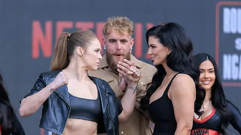 March-10-2026-Inglewood-California-USA-Ronda-Rousey-and-Gina-Carano-pose-with-Jake-Paul-center-after-a-Most-Valuable-Promotions-and-Netflix-news-conference-at-Intuit-Dome-in-Inglewood-California-on-Tuesday-March-10-2026-promoting-their-upcoming-fight-scheduled-for-May-16-2026-JAVIER-ROJAS-PI-Rousey-Vs