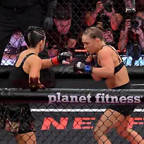May-16-2026-Los-Angeles-California-USA-Ronda-Rousey-blue-gloves-fights-Gina-Carano-red-gloves-in-a-women-s-featherweight-bout-at-Intuit-Dome