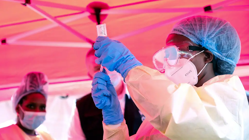 A-health-worker-prepares-to-administer-a-vial-of-a-vaccine-against-the-Sudan-strain-of-Ebola-during-a-trial-at-Mulago-Referral-Hospital-in-Kampala-Uganda-Monday-Feb-3-2025