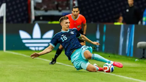 MAINZ-GERMANY-MAY-31-Nico-Schlotterbeck-Germany-15-slides-to-secure-the-ball-during-the-International-Friendly-Germany-vs-Finland-at-MEWA-Arena-on-May-31-2026-in-Mainz-Germany