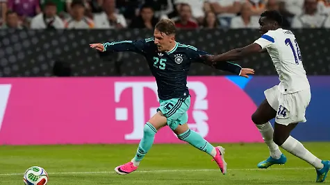 Finland-s-Ryan-Mahuta-right-grabs-Germany-s-Lennart-Karl-during-the-friendly-soccer-match-between-Germany-and-Finland-in-Mainz-Germany-Sunday-May-31-2026