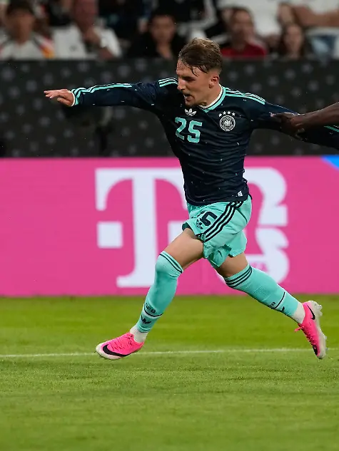 Finland-s-Ryan-Mahuta-right-grabs-Germany-s-Lennart-Karl-during-the-friendly-soccer-match-between-Germany-and-Finland-in-Mainz-Germany-Sunday-May-31-2026