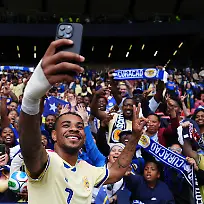 Scotland-v-Curacao-International-Friendly-Hampden-Park-Curacao-s-Juninho-Bacuna-with-fans-following-an-international-friendly-match-at-Hampden-Park-Glasgow-Picture-date-Saturday-May-30-2026-Photo-credit-should-read-Andrew-Milligan-PA-Wire-RESTRICTIONS-Use-subject-to-restrictions-Editorial-use-only-no-commercial-use-without-prior-consent-from-rights-holder