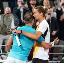 French-Open-Nadal-Loses-On-Possible-Farewell-Spain-s-Rafael-Nadal-R-checks-hands-with-the-winner-Germany-s-Alexander-Zverev-after-their-men-s-singles-match-on-Court-Philippe-Chatrier-on-day-two-of-the-French-Open-tennis-tournament-at-the-Roland-Garros-Complex-in-Paris-on-May-27-2024-Nadal-s-return-to-the-French-Open-and-possible-farewell-ended-at-the-first-hurdle-as-the-14-time-winner-lost-to-Alexander-Zverev-The-22-time-Grand-Slam-champion-was-beaten-6-3-7-6-7-5-6-3-by-the-in-form-German-fourth-seed-Nadal-has-become-synonymous-with-Roland-Garros-but-in-front-of-a-partisan-crowd-he-could-not-replicate-the-level-which-has-made-him-almost-unbeatable-on-the-Paris-clay-Photo-by-Alexis-Jumeau-ABACAPRESS