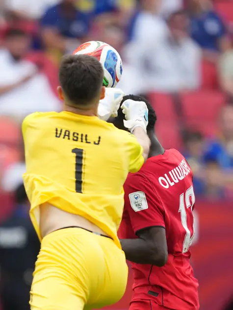 June-12-2026-Nikola-Vasilj-Bosnia-And-Herzegovina-and-Tajon-Buchanan-Canada-battle-for-the-ball-during-Canada-and-Bosnia-and-Herzegovina-FIFA-World-Cup-2026-at-Toronto-Stadium-in-Toronto-Canada