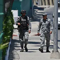 TIJUANA-MEXICO-JUNE-09-Mexican-National-Guard-officers-patrol-outside-the-Marriott-Tijuana-Hotel-on-Tuesday-June-09-2026-in-Tijuana-Mexico-where-Iran-s-National-Team-players-are-staying-overnight-while-conducting-their-training-sessions-at-the-Caliente-Football-Stadium-nearby-before-their-game-in-Los-Angeles-California-for-the-FIFA-2026-World-Cup-football-tournament-Carlos-A